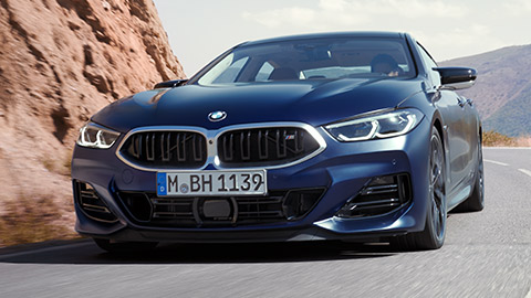 BMW Серија 8 Gran Coupé (G16) тричетвртински заден поглед во возење