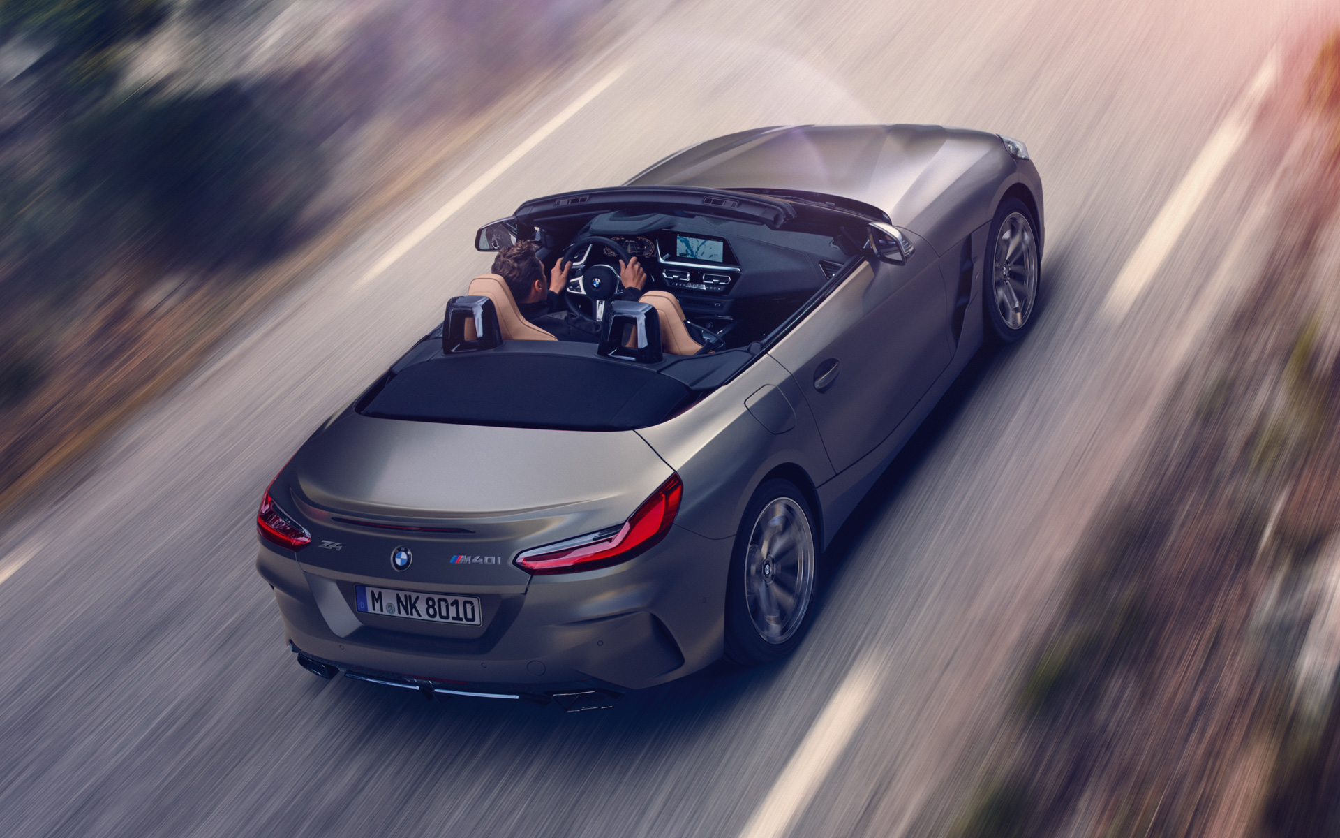 BMW Z4 M40i Roadster G29 2019 BMW Individual Frozen Grey металик во возење со отворен мек кров поглед одгоре