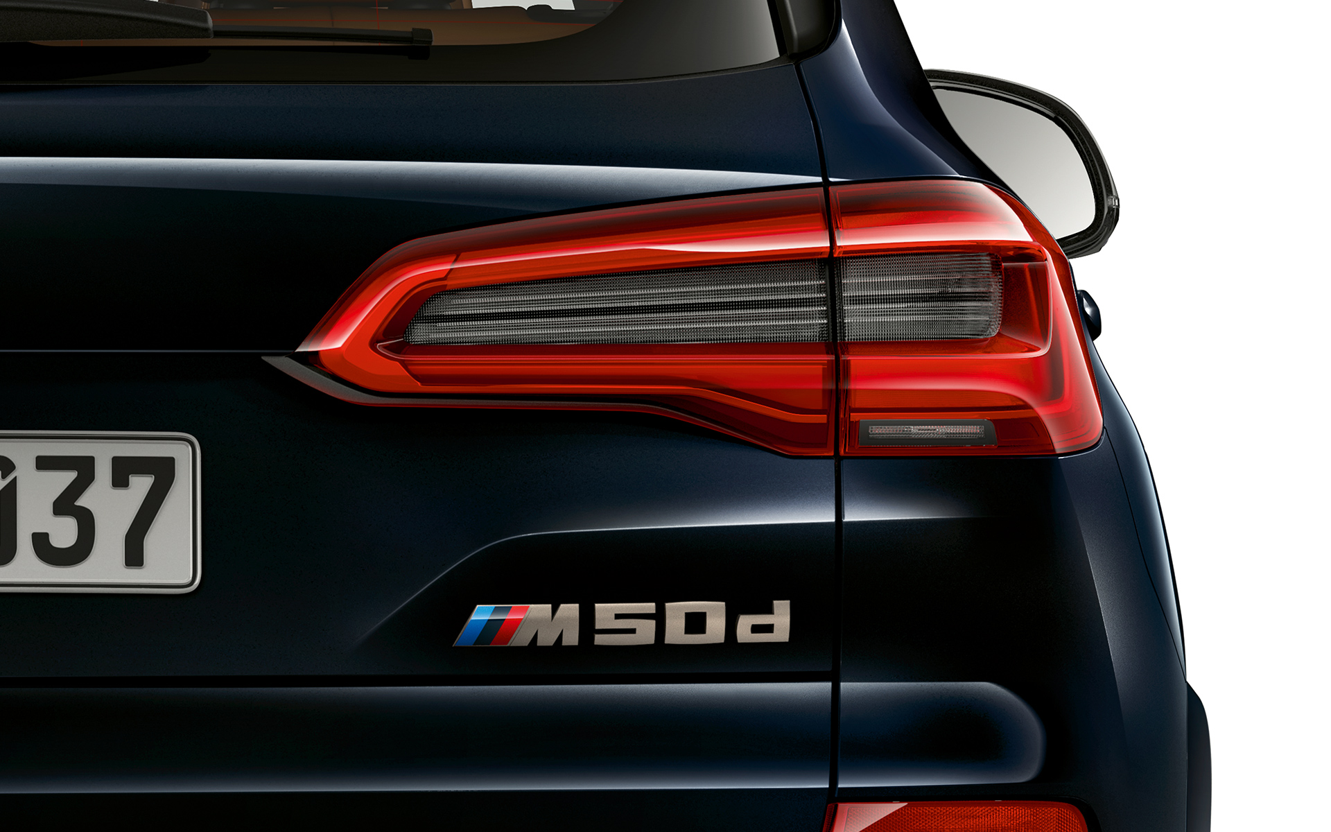 Заден шрифт на BMW X5 M50d Детален кадар на ознаката на моделот за BMW X5 M50d