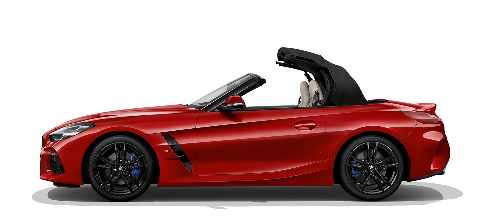 Страничен кадар на BMW Z4 Roadster Страничен кадар на BMW Z4 Roadster, покривот се отвора