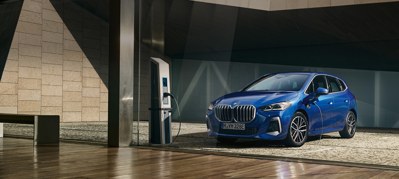 BMW 2 Series Active Tourer 230e plug-in hybrid U06 at charging station BMW e-mobility BMW 2 Series Active Tourer 230e plug-in hybrid U06 at charging station